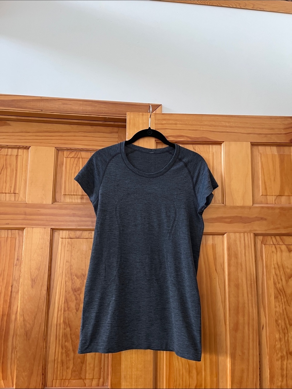 Lululemon athletica Heathered Dark Gray Short Sleeve top.